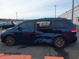 2011 Toyota Sienna XLE AAS with VIN 5TDYK3DCXBS113103, listed as a IAAI auction lot 41505972 with 170,919 mi miles and . Bid and sale history available at DreamBid. Image 14.