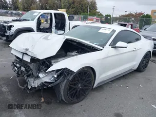 2016 Ford Mustang EcoBoost with VIN 1FA6P8THXG5206192, listed as a IAAI auction lot 42397412 with 117,656 mi miles and . Bid and sale history available at DreamBid. Image 2.