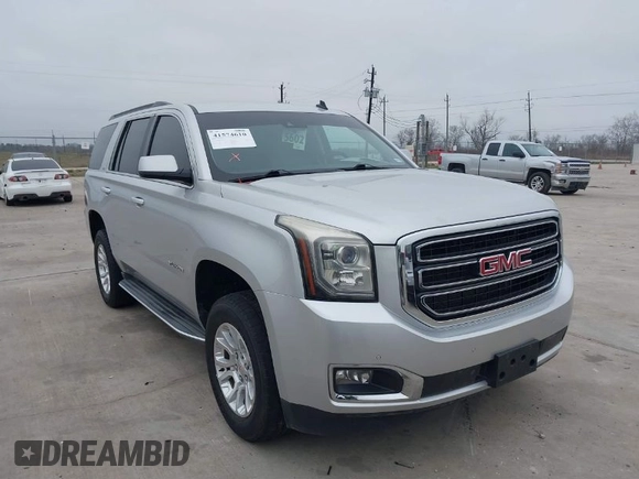 2015 GMC Yukon SLT with VIN 1GKS1BKC3FR253184, listed as a IAAI auction lot 41574610 with 152,543 mi miles. Bid and sale history available at carsss.com. Image 1.