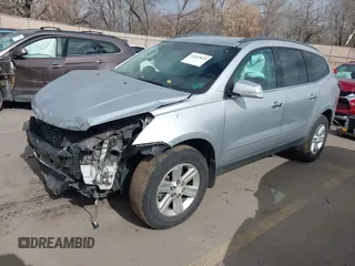 2013 Chevrolet Traverse LT with VIN 1GNKVGKD6DJ240146, listed as a IAAI auction lot 41665024 with 118,648 mi miles and . Bid and sale history available at DreamBid. Image 2.