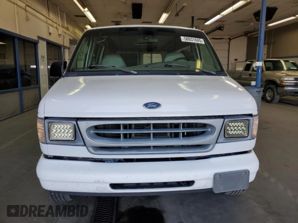 2001 Ford Econoline Cargo with VIN 1FTRE14291HA69623, listed as a Copart auction lot 50031845 with 103,169 mi miles and Salvage Title. Bid and sale history available at carsss.com. Image 5.