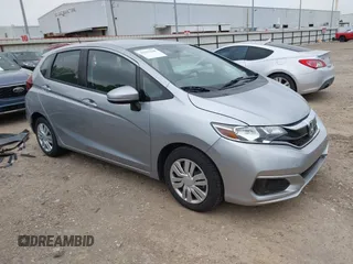 2019 Honda Fit LX z VIN 3HGGK5H49KM732755, wystawiony jako IAAI lot #42193648 z przebiegiem 43 776 mil mil oraz . Historia ofert i sprzedaży dostępna na DreamBid. Obrazek 1.
