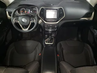2015 Jeep Cherokee Latitude with VIN 1C4PJMCS5FW624799, listed as a Copart auction lot 52339795 with 142,681 mi miles and Salvage Title. Bid and sale history available at DreamBid. Image 8.