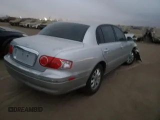 2005 Kia Amanti z VIN KNALD124655077857, wystawiony jako Copart lot #83788734 z przebiegiem Nie podano mil oraz Szkoda całkowita • Salvage title. Historia ofert i sprzedaży dostępna na DreamBid. Obrazek 3.