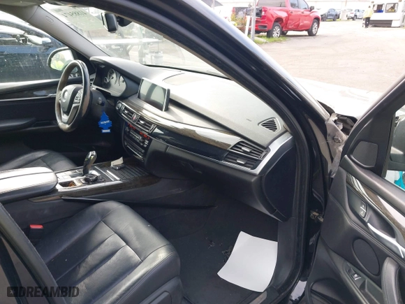 2015 BMW X5 sDrive35i with VIN 5UXKR2C54F0H35124, listed as a IAAI auction lot 41885474 with 88,865 mi miles. Bid and sale history available at carsss.com. Image 5.