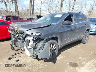 2015 Jeep Cherokee Limited with VIN 1C4PJMDB7FW591772, listed as a IAAI auction lot 41684106 with 118,708 mi miles and . Bid and sale history available at DreamBid. Image 6.