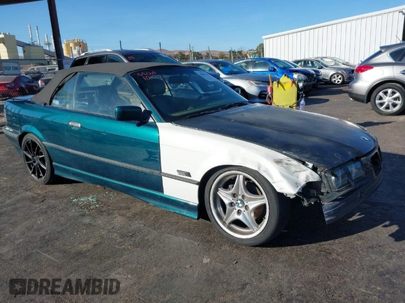 1997 BMW 3-Series 328IC with VIN WBABK8323VET99072, listed as a IAAI auction lot 40669447 with 135,584 mi miles. Bid and sale history available at carsss.com. Image 1.