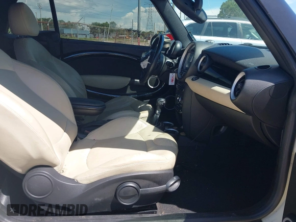2015 MINI Convertible with VIN WMWZN3C53FT861968, listed as a IAAI auction lot 42717485 with 79,840 mi miles and . Bid and sale history available at DreamBid. Image 5.