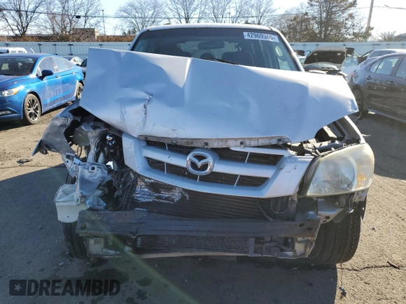 2006 Mazda Tribute S with VIN 4F2YZ04166KM17017, listed as a Copart auction lot 42969365 with 217,984 mi miles and Salvage Title. Bid and sale history available at DreamBid. Image 5.