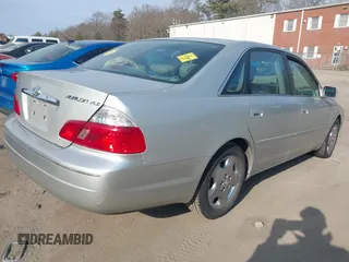2003 Toyota Avalon XL with VIN 4T1BF28B13U285647, listed as a IAAI auction lot 41791156 with 173,323 mi miles and . Bid and sale history available at carsss.com. Image 4.
