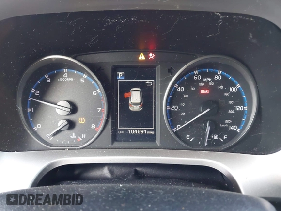 2018 Toyota RAV4 LE with VIN JTMZFREV1JJ203943, listed as a IAAI auction lot 41921863 with 104,691 mi miles. Bid and sale history available at carsss.com. Image 7.
