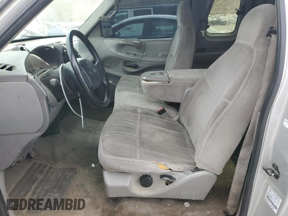 1998 Ford F-150 with VIN 2FTZX0729WCA50004, listed as a Copart auction lot 50028895 with 291,952 mi miles and Salvage title. Bid and sale history available at DreamBid. Image 7.