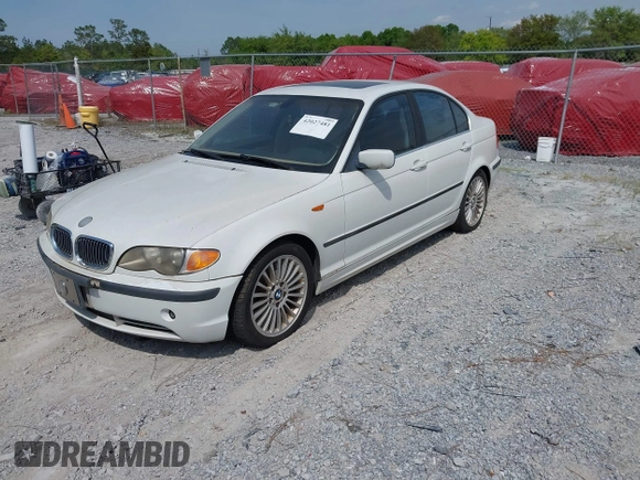 2003 BMW 3 Series 330i with VIN WBAEV53443KM30865, listed as a IAAI auction lot 42027481 with 1 mi miles. Bid and sale history available at carsss.com. Image 2.