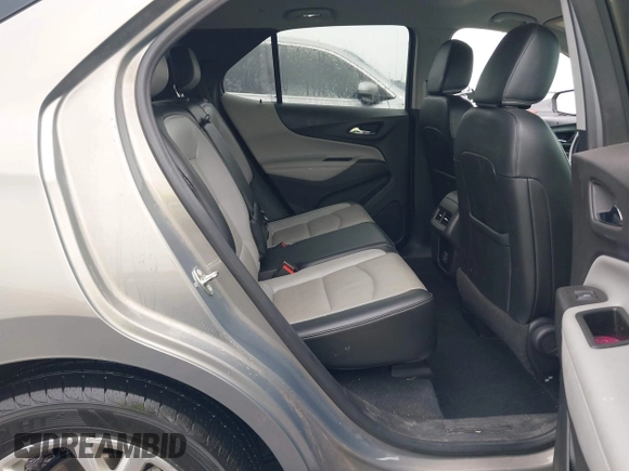 2019 Chevrolet Equinox Premier z VIN 3GNAXNEVXKS503474, wystawiony jako IAAI lot #42084263 z przebiegiem 93 838 mil mil oraz . Historia ofert i sprzedaży dostępna na DreamBid. Obrazek 8.