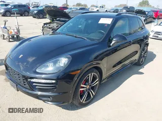 2014 Porsche Cayenne GTS z VIN WP1AD2A24ELA76457, wystawiony jako IAAI lot #41538390 z przebiegiem 101 082 mil mil oraz . Historia ofert i sprzedaży dostępna na DreamBid. Obrazek 22.