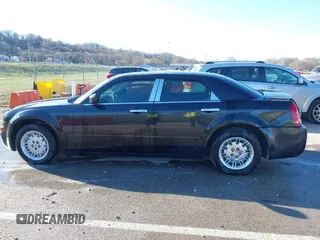 2007 Chrysler 300 with VIN 2C3KA43R87H691098, listed as a IAAI auction lot 41807592 with 99,208 mi miles. Bid and sale history available at carsss.com. Image 14.