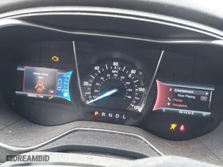 2015 Ford Fusion Titanium Hybrid with VIN 3FA6P0RU8FR181312, listed as a IAAI auction lot 42071584 with 99,955 mi miles. Bid and sale history available at carsss.com. Image 7.