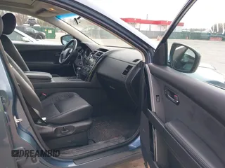 2015 Mazda CX-9 Touring with VIN JM3TB3CVXF0460959, listed as a IAAI auction lot 41940912 with 166,674 mi miles and . Bid and sale history available at DreamBid. Image 5.