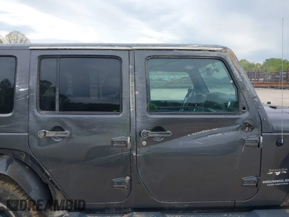 2017 Jeep Wrangler Unlimited Sahara with VIN 1C4BJWEGXHL595724, listed as a IAAI auction lot 42018264 with 95,948 mi miles. Bid and sale history available at carsss.com. Image 6.