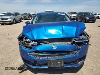 2018 Ford Fusion Titanium z VIN 3FA6P0D93JR187966, wystawiony jako Copart lot #54171825 z przebiegiem 86 575 mil mil oraz Szkoda całkowita • Salvage title. Historia ofert i sprzedaży dostępna na DreamBid. Obrazek 5.