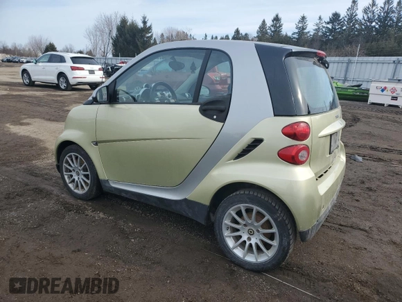 2009 Smart fortwo Pure z VIN WMEEJ31X49K292142, wystawiony jako Copart lot #48928535 z przebiegiem 226 263 mil mil oraz Tytuł czysty. Historia ofert i sprzedaży dostępna na DreamBid. Obrazek 2.