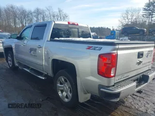 2018 Chevrolet Silverado 1500 LTZ with VIN 3GCUKSECXJG536316, listed as a IAAI auction lot 41432469 with 127,276 mi miles. Bid and sale history available at carsss.com. Image 3.