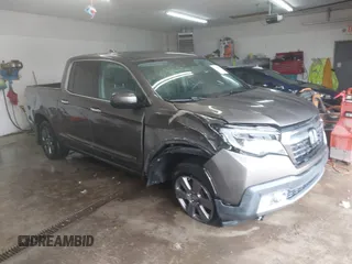 2020 Honda Ridgeline RTL-E with VIN 5FPYK3F75LB001516, listed as a IAAI auction lot 41605859 with 93,902 mi miles and . Bid and sale history available at DreamBid. Image 1.