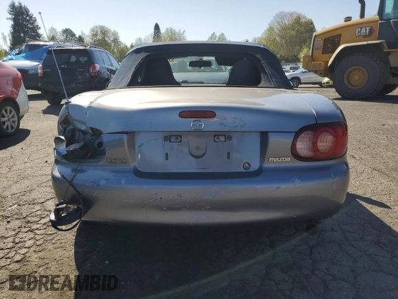 2003 Mazda MX-5 Miata Cloth with VIN JM1NB353430308653, listed as a Copart auction lot 53129865 with 144,549 mi miles and Salvage Title. Bid and sale history available at DreamBid. Image 6.
