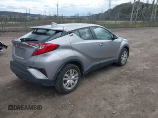 2019 Toyota C-HR XLE with VIN NMTKHMBX7KR079751, listed as a IAAI auction lot 42013399 with 74,665 mi miles. Bid and sale history available at carsss.com. Image 4.