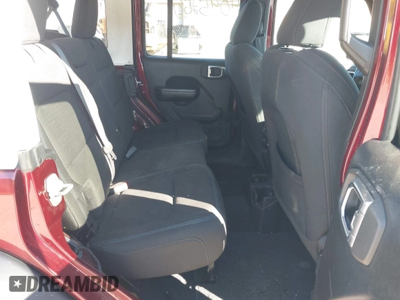 2021 Jeep Wrangler Unlimited Sport S with VIN 1C4HJXDG4MW647164, listed as a IAAI auction lot 40952672 with 51,366 mi miles and . Bid and sale history available at DreamBid. Image 8.