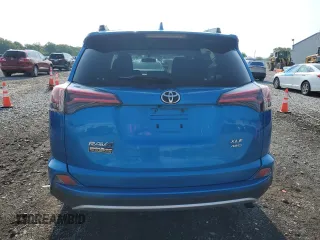 2016 Toyota RAV4 XLE with VIN 2T3RFREV5GW440302, listed as a Copart auction lot 59887345 with 118,425 mi miles and Salvage title. Bid and sale history available at DreamBid. Image 6.