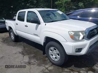 2015 Toyota Tacoma with VIN 3TMLU4EN5FM169482, listed as a IAAI auction lot 42520722 with 160,965 mi miles and . Bid and sale history available at DreamBid. Image 1.
