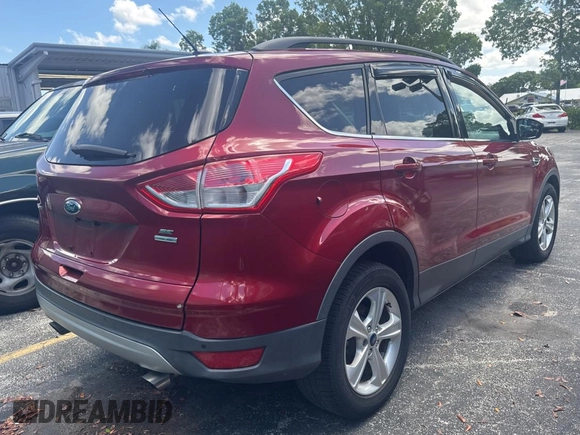 2014 Ford Escape SE with VIN 1FMCU9GXXEUB75330, listed as a Copart auction lot 62310025 with 119,858 mi miles and Clean title. Bid and sale history available at DreamBid. Image 4.