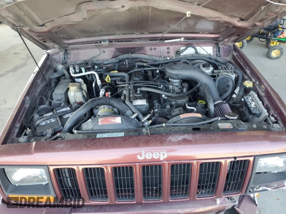 2000 Jeep Cherokee Classic with VIN 1J4FF58S8YL135534, listed as a Copart auction lot 62211335 with 108,888 mi miles and Salvage title. Bid and sale history available at DreamBid. Image 11.