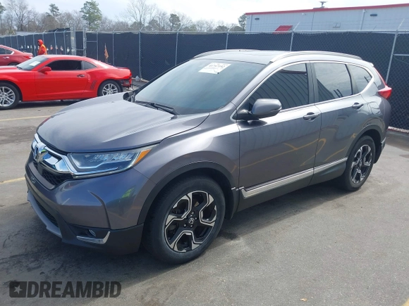 2018 Honda CR-V Touring with VIN 7FARW1H9XJE018575, listed as a IAAI auction lot 41747192 with 83,699 mi miles and . Bid and sale history available at carsss.com. Image 2.