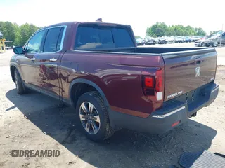 2019 Honda Ridgeline RTL-E with VIN 5FPYK3F72KB031085, listed as a IAAI auction lot 42236249 with 73,612 mi miles and . Bid and sale history available at DreamBid. Image 3.