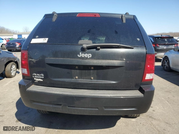 2009 Jeep Grand Cherokee Laredo with VIN 1J8GR48K19C533447, listed as a Copart auction lot 48700275 with 115,991 mi miles and Salvage Title. Bid and sale history available at carsss.com. Image 6.