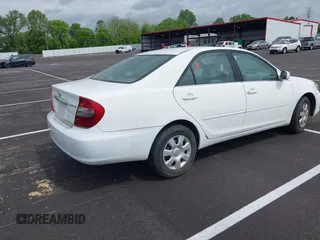 2004 Toyota Camry LE with VIN 4T1BE32K64U277496, listed as a IAAI auction lot 42130199 with 250,972 mi miles. Bid and sale history available at carsss.com. Image 4.
