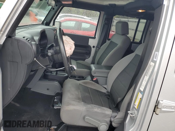 2008 Jeep Wrangler Unlimited X with VIN 1J4GB39148L565250, listed as a Copart auction lot 51170505 with 153,344 mi miles and Salvage Title. Bid and sale history available at DreamBid. Image 7.