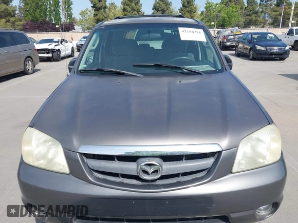 2003 Mazda Tribute LX with VIN 4F2YZ04193KM08890, listed as a IAAI auction lot 42158385 with 282,314 mi miles and . Bid and sale history available at carsss.com. Image 6.