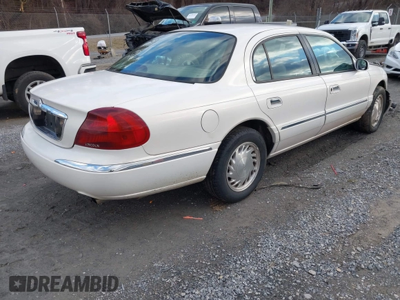 1998 Lincoln Continental with VIN 1LNFM97VXWY619313, listed as a IAAI auction lot 41477852 with 158,973 mi miles. Bid and sale history available at carsss.com. Image 4.