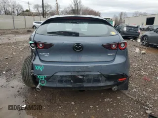 2024 Mazda 3 S Carbon Edition with VIN JM1BPBLM7R1656105, listed as a Copart auction lot 49141345 with 20,596 mi miles and Salvage title. Bid and sale history available at DreamBid. Image 6.