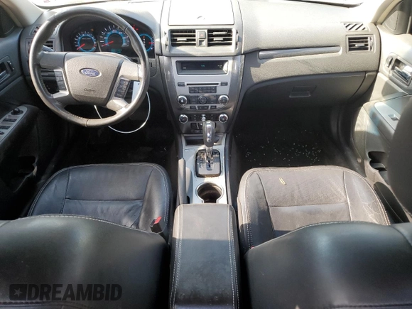 2012 Ford Fusion SEL z VIN 3FAHP0JA9CR333944, wystawiony jako Copart lot #56907605 z przebiegiem 180 386 mil mil oraz Szkoda całkowita • Salvage title. Historia ofert i sprzedaży dostępna na DreamBid. Obrazek 8.