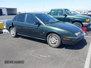 1999 Saturn SL with VIN 1G8ZK5274XZ304652, listed as a IAAI auction lot 42618620 with 98,131 mi miles and . Bid and sale history available at DreamBid. Image 1.
