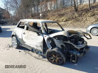 2012 MINI Hardtop S with VIN WMWSV3C55CTY26121, listed as a IAAI auction lot 41720493 with Not Provided miles and . Bid and sale history available at DreamBid. Image 1.