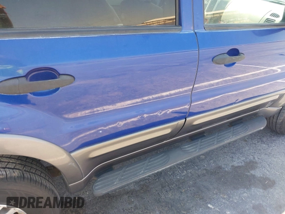 2005 Ford Escape XLT with VIN 1FMYU03155KB63374, listed as a IAAI auction lot 42739496 with 128,768 mi miles and . Bid and sale history available at DreamBid. Image 12.