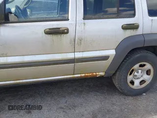 2004 Jeep Liberty Sport with VIN 1J4GL48K64W191486, listed as a IAAI auction lot 42081883 with 179,964 mi miles. Bid and sale history available at carsss.com. Image 6.