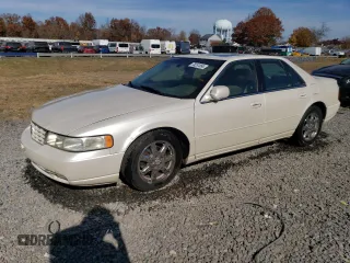 2002 Cadillac Seville Touring STS z VIN 1G6KY54922U151685, wystawiony jako Copart lot #78251854 z przebiegiem Nie podano mil oraz Szkody całkowita. Historia ofert i sprzedaży dostępna na DreamBid. Obrazek 1.