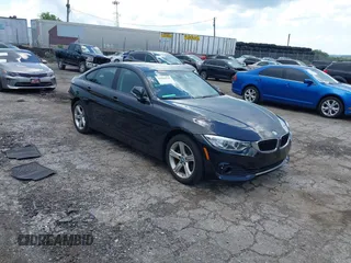 2015 BMW 4 Series 428i xDrive with VIN WBA4C9C52FD331620, listed as a IAAI auction lot 42556526 with 115,674 mi miles and . Bid and sale history available at DreamBid. Image 1.
