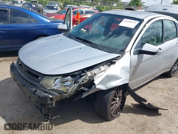 2011 Ford Focus SES with VIN 1FAHP3GN9BW107720, listed as a IAAI auction lot 41949472 with 238,639 mi miles. Bid and sale history available at carsss.com. Image 6.
